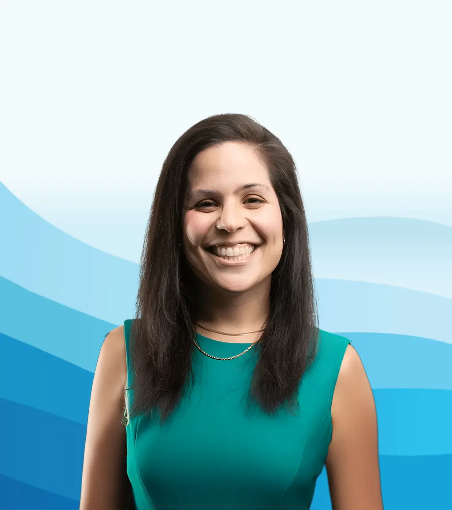 Smiling woman with long dark hair wearing a sleeveless teal top against a blue wave-patterned background.