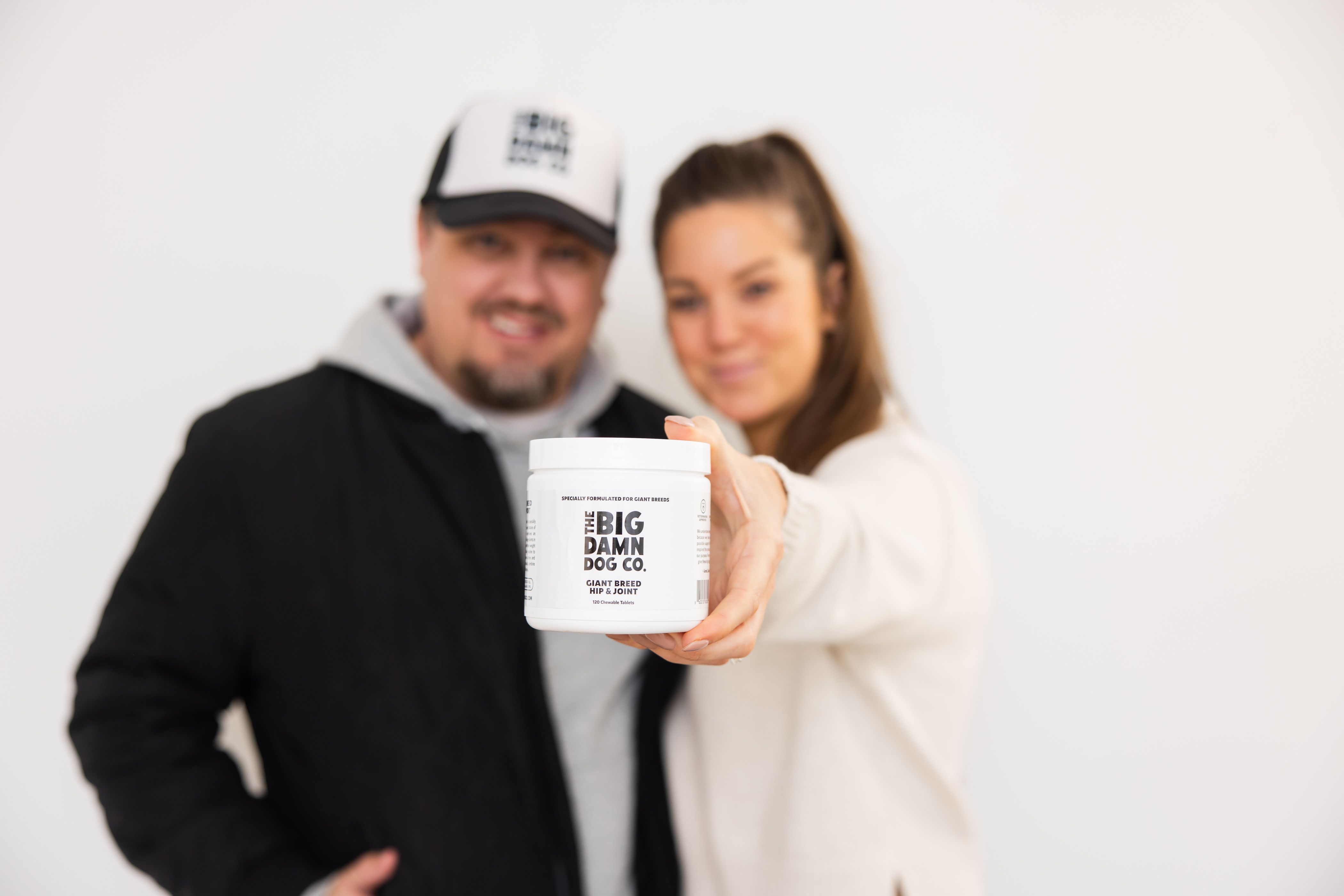 Jared and Sarah McLean with Big Damn Dog Co. Giant Breed Hip & Joint Chewable Tablets