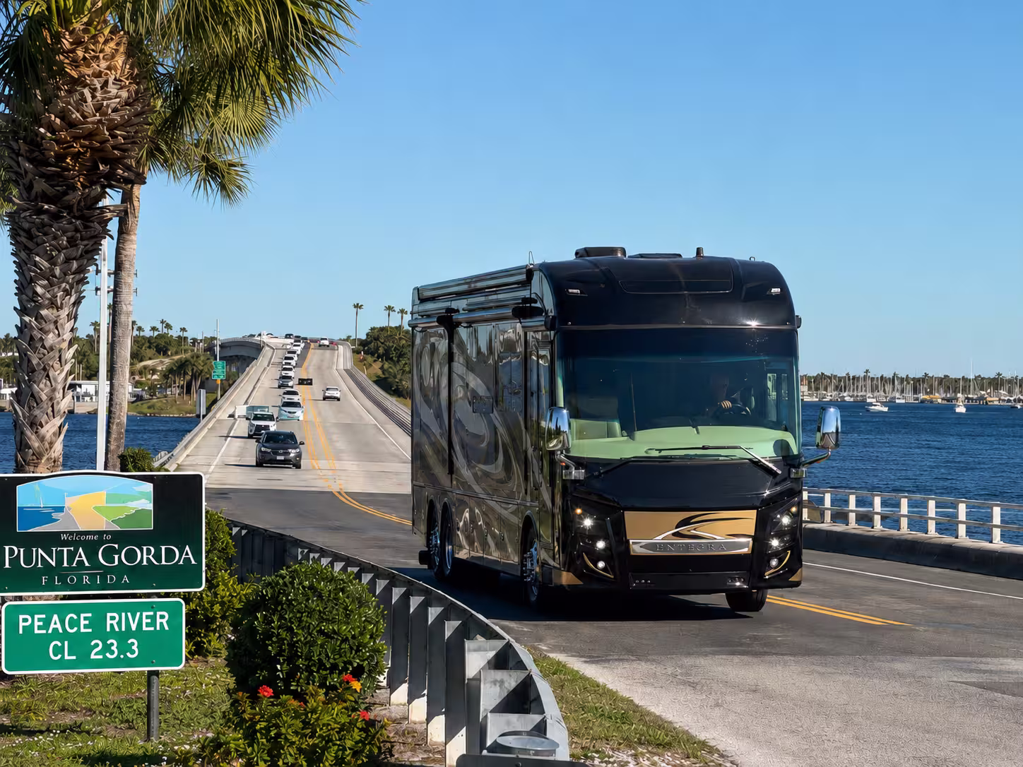 Luxury motorhome crossing the Peace River bridge into Punta Gorda