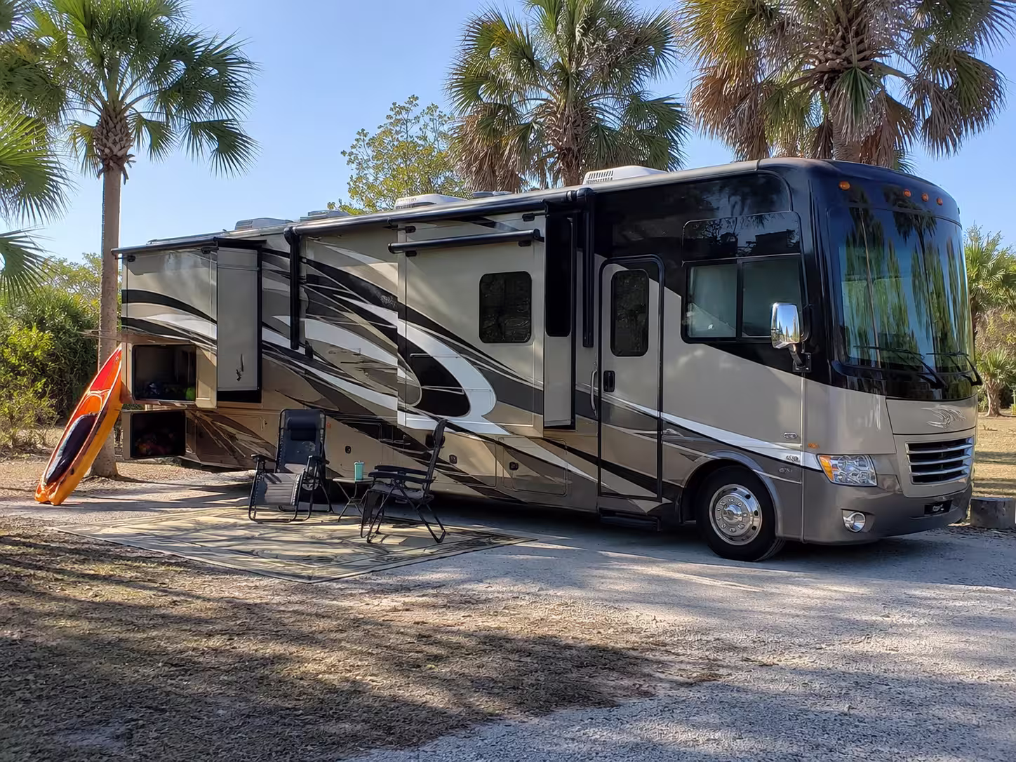 Large Class A motorhome rental parked at a Punta Gorda RV site