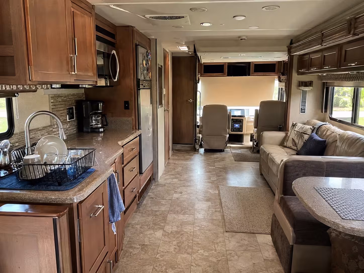 Class A motorhome kitchen and slide-out set up for a monthly stay