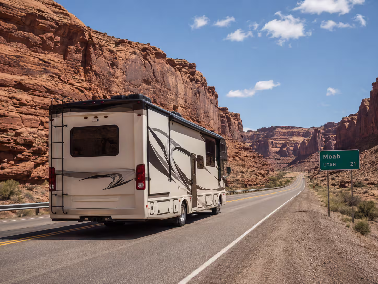 Large RV on a canyon route toward Moab, Utah