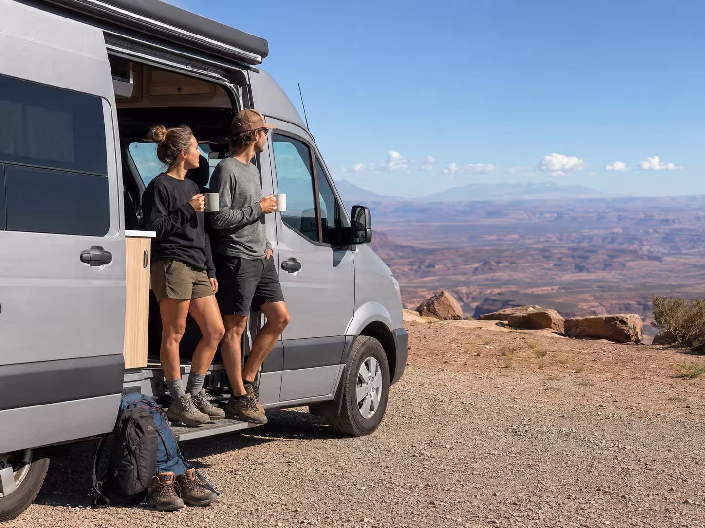 Couple at a camper van overlook in Utah