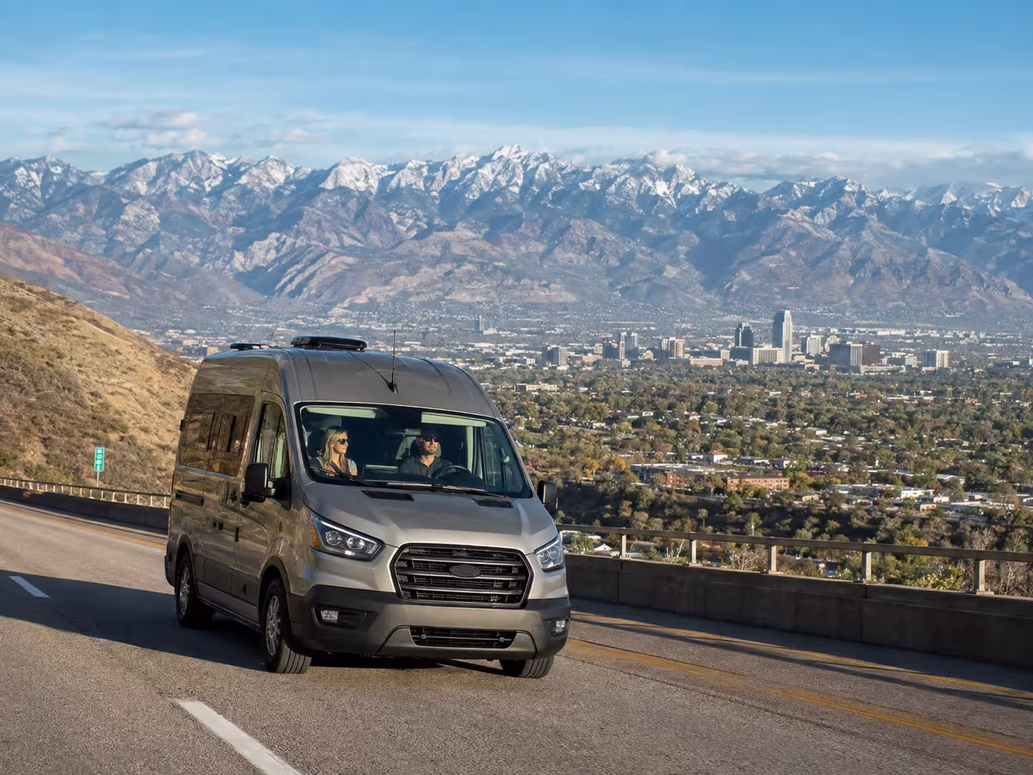 Class B camper van on a Wasatch mountain highway near Salt Lake City