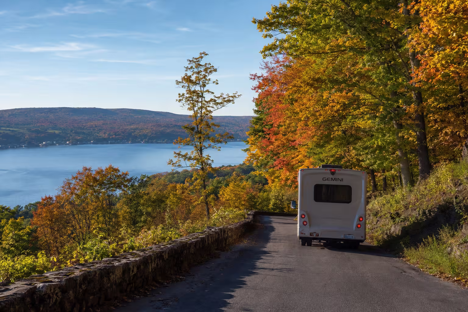 Small motorhome on a Keuka Lake road in fall, Finger Lakes NY