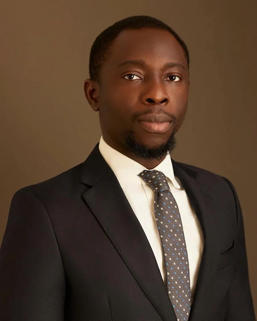 Image featuring A woman 2 Men and another woman all sitting across a table in an office meeting