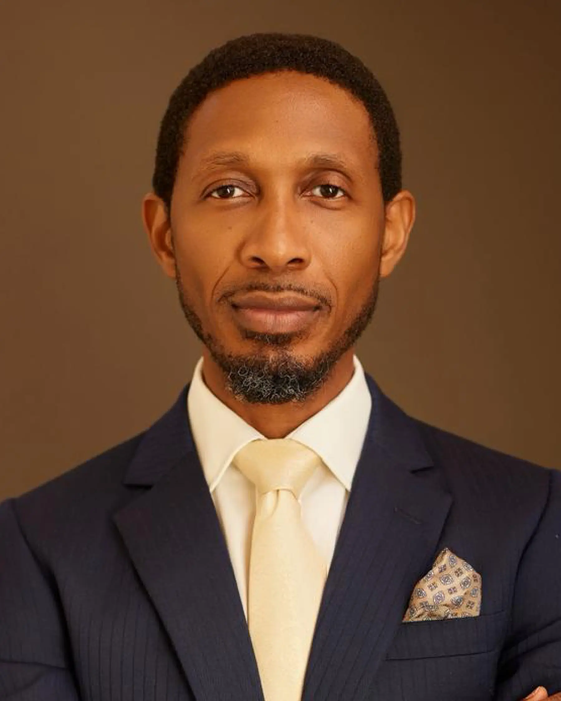 Image featuring A woman 2 Men and another woman all sitting across a table in an office meeting