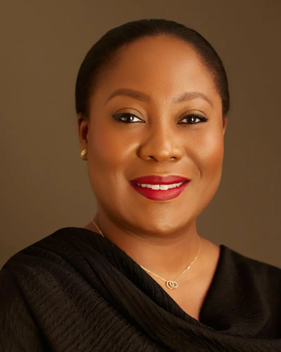 Image featuring A woman 2 Men and another woman all sitting across a table in an office meeting