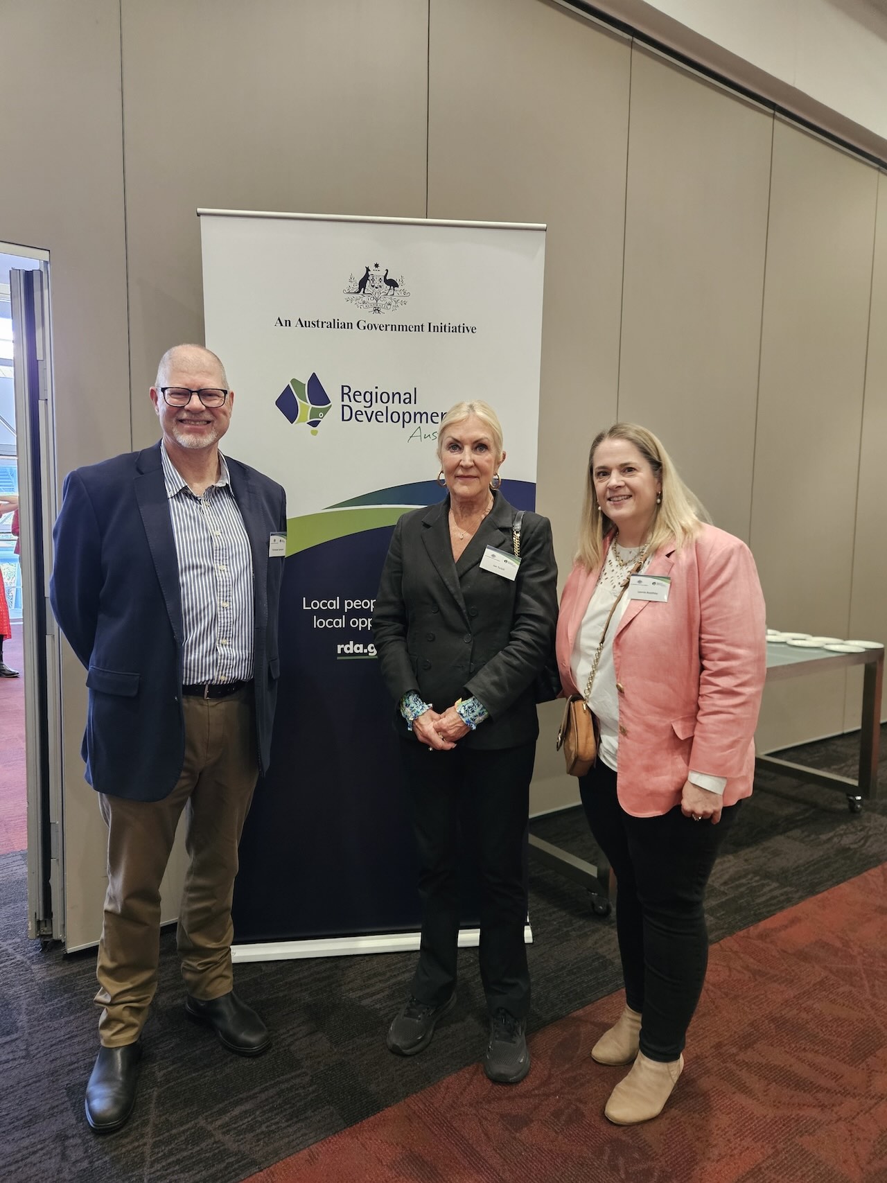 Chris Sampson, Jan Turbil and Leonie Boothby from Regional Development Australia Adelaide in front of a RDA sign.