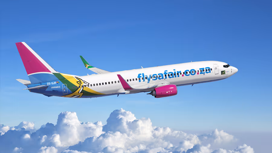 FlySafair commercial airplane flying above clouds with clear blue sky background.