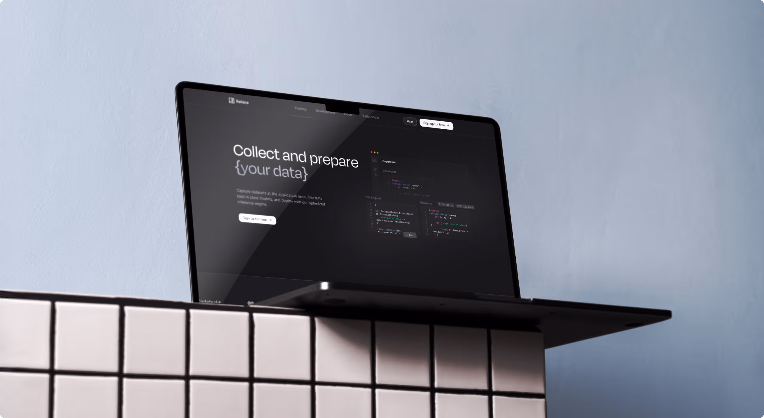Open laptop on tiled surface displaying a webpage with the text 'Collect and prepare your data' and code snippets.