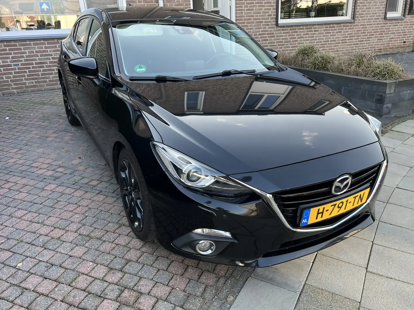 Mazda 3 bij controle van voertuighistorie vóór aankoop