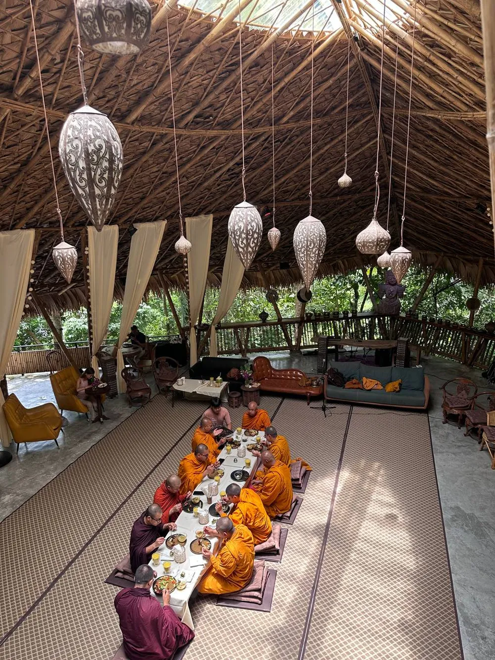 Evening event in dome shala with purple lighting and hanging decorations