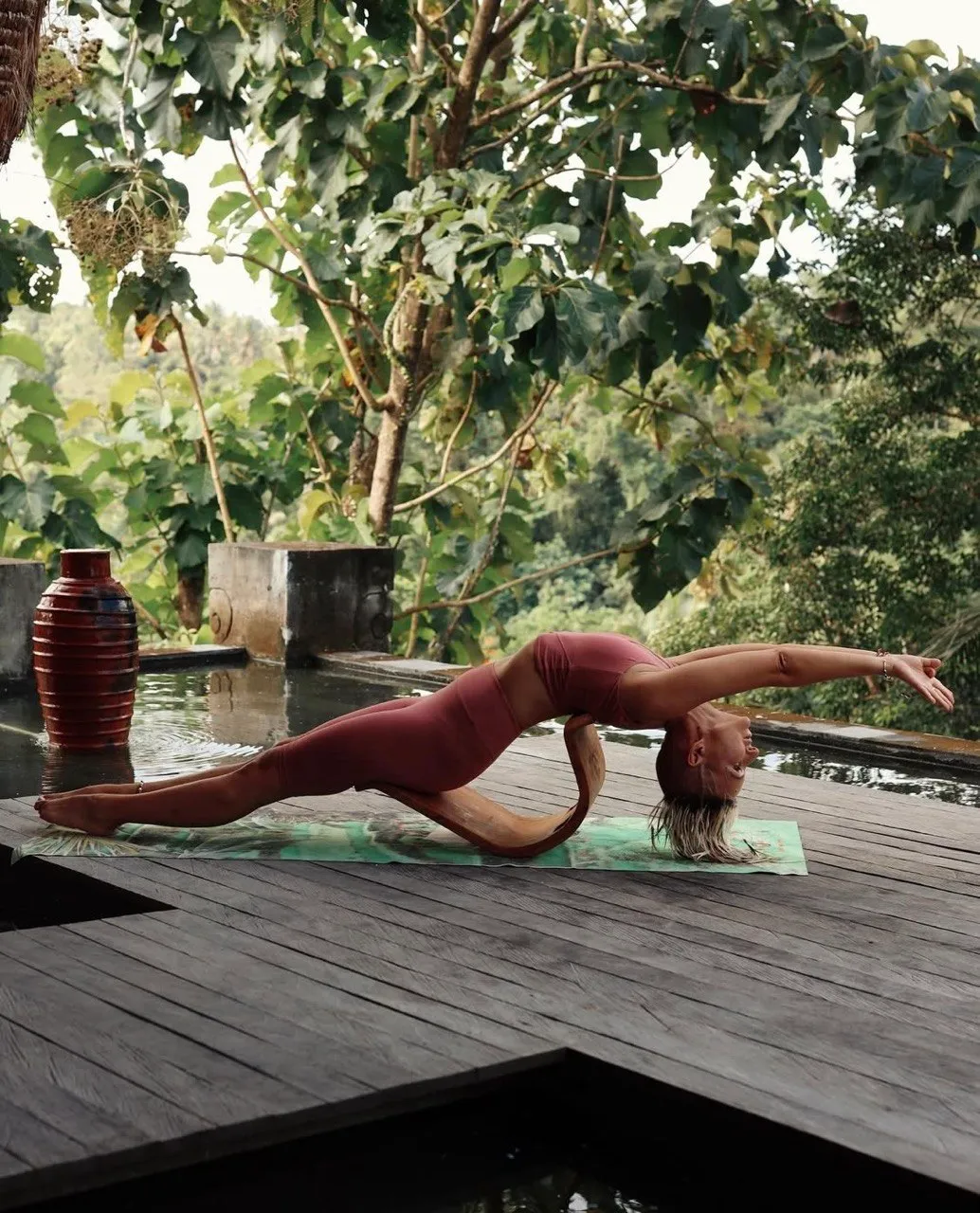 Spine Alignment Yoga Therapy practice on a jungle deck at Shivari