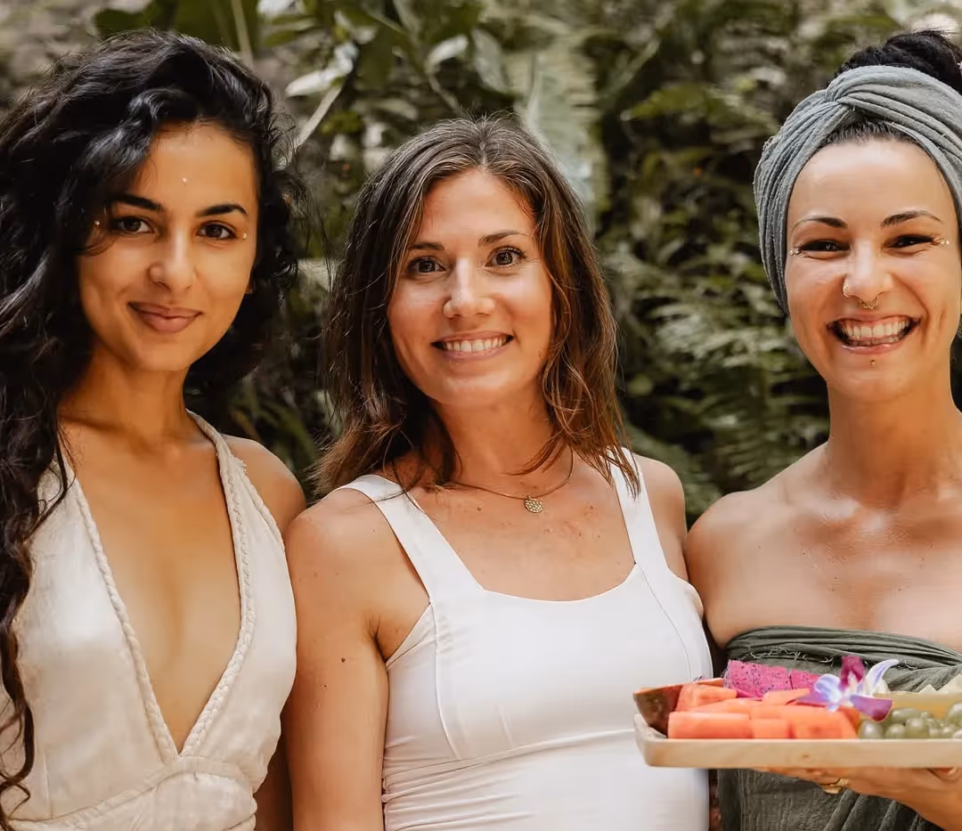 Three smiling women together at Venus Goddess retreat at Shivari