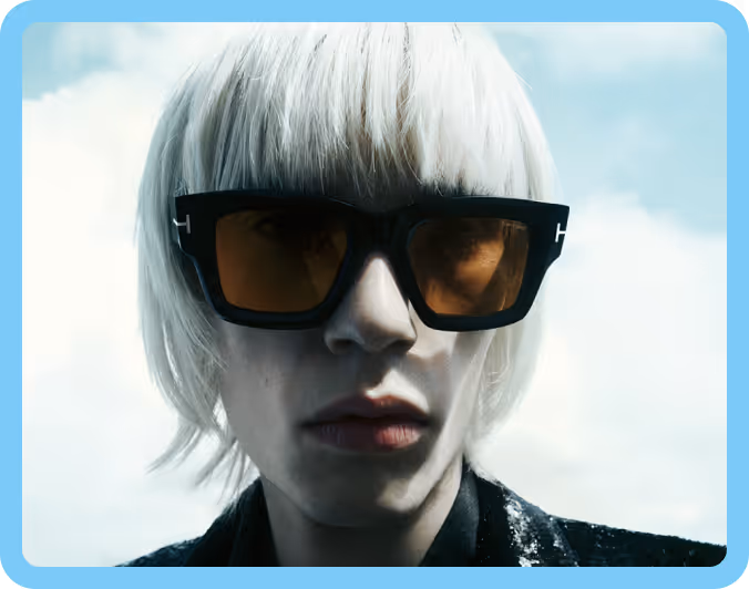 Man with white hair wearing sunglasses with orange tint