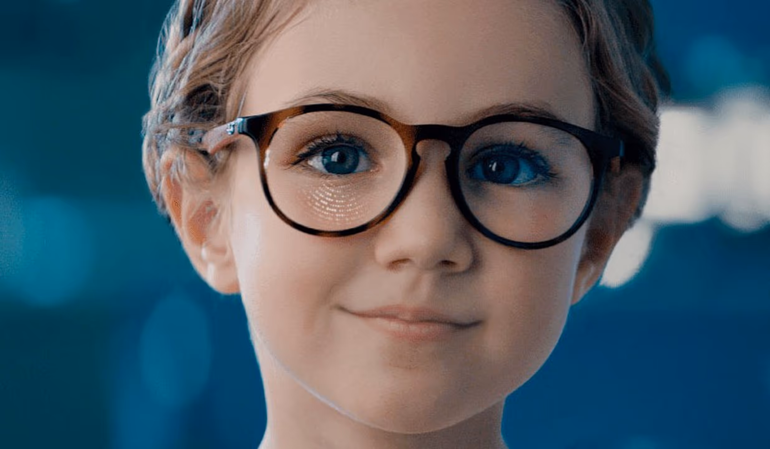 Young boy wearing glasses