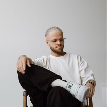 Minimal portrait of man in neutral outfit