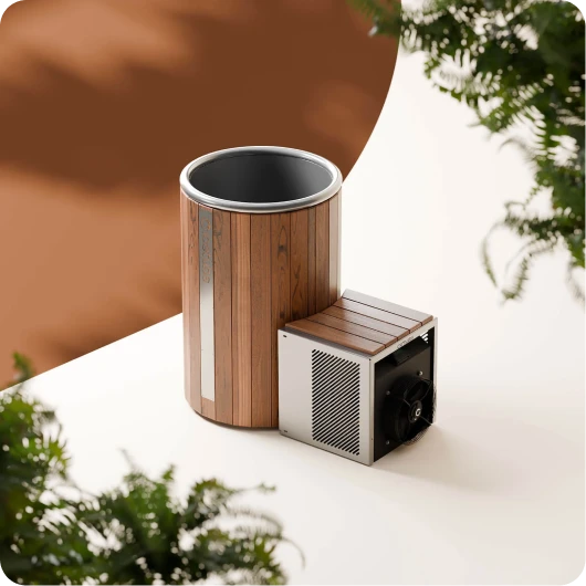 Modern ice barrel with wooden exterior and attached cooling unit on a white surface with blurred greenery around.