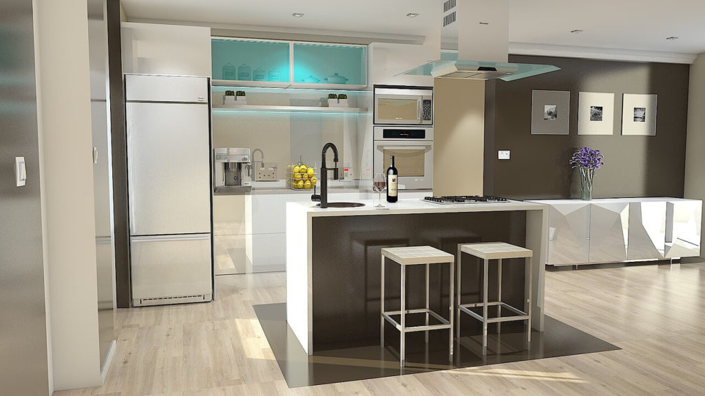 Modern white kitchen with sleek cabinets, stainless steel appliances, large island with bar stools, and hardwood floors