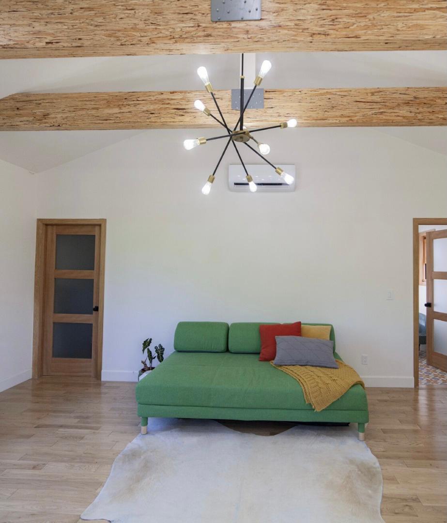 Converted garage ADU living space Los Angeles with vaulted ceiling and wood beam details