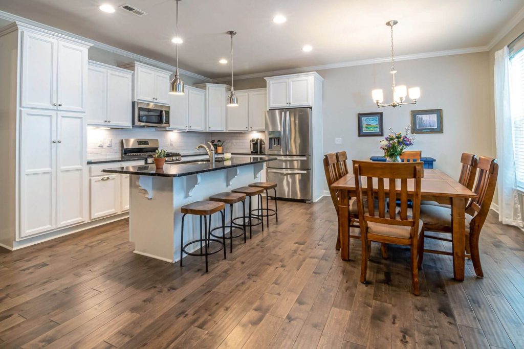 Modern kitchen remodel Los Angeles with white shaker cabinets, quartz countertops and stainless steel appliances