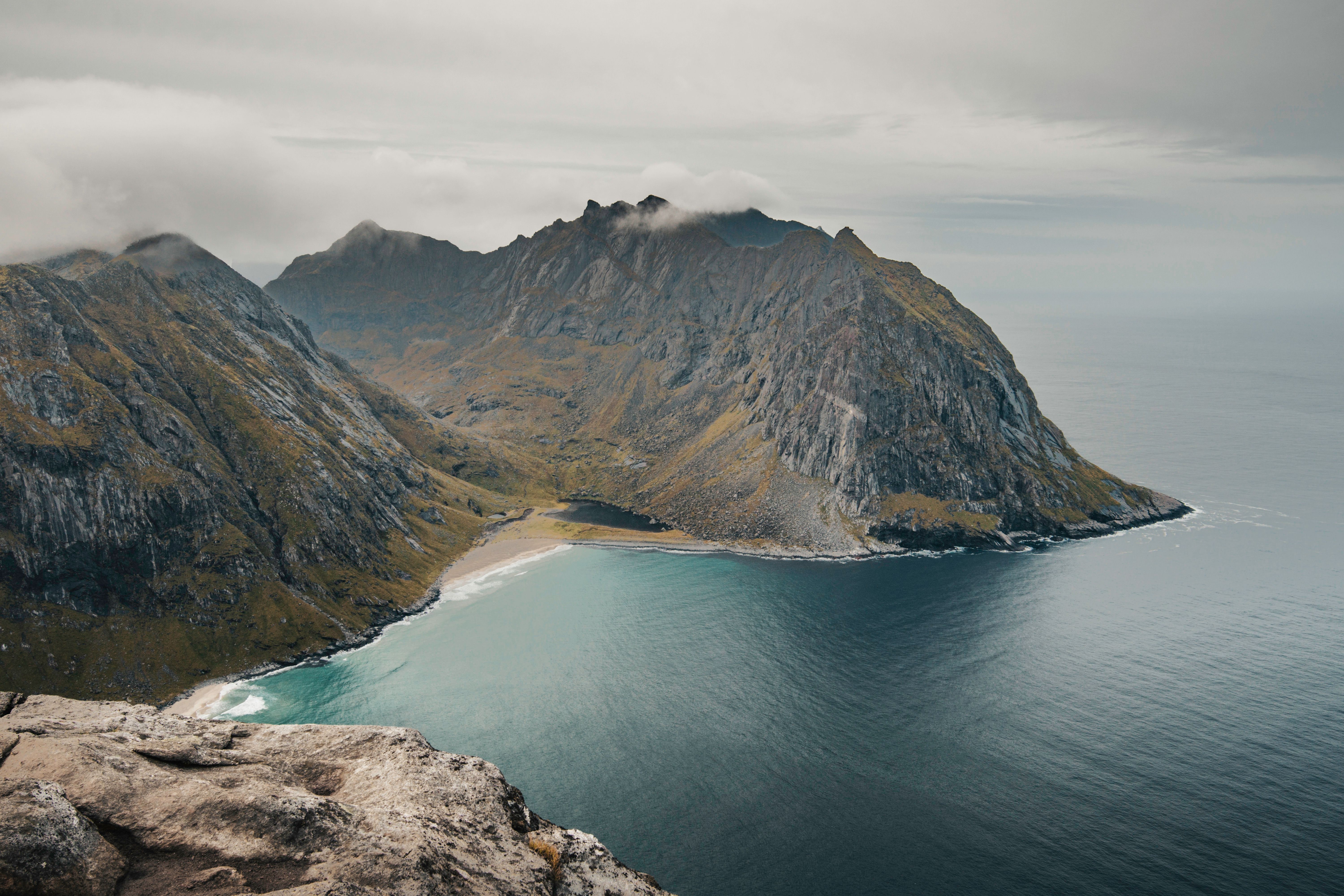 Aerial view of a rugged mountain coastline in Norway