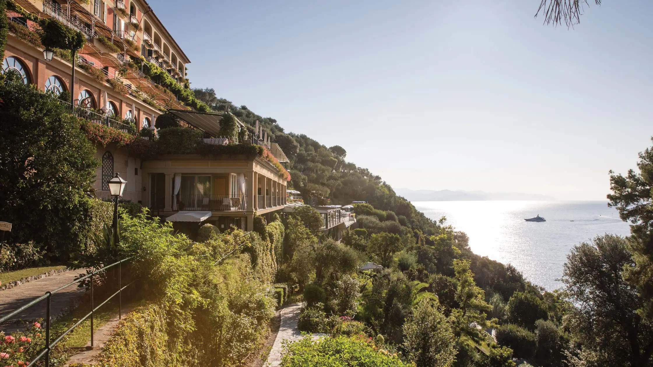Portofino: Luxurious coastal hotel nestled on a lush hillside overlooking Mediterranean sea