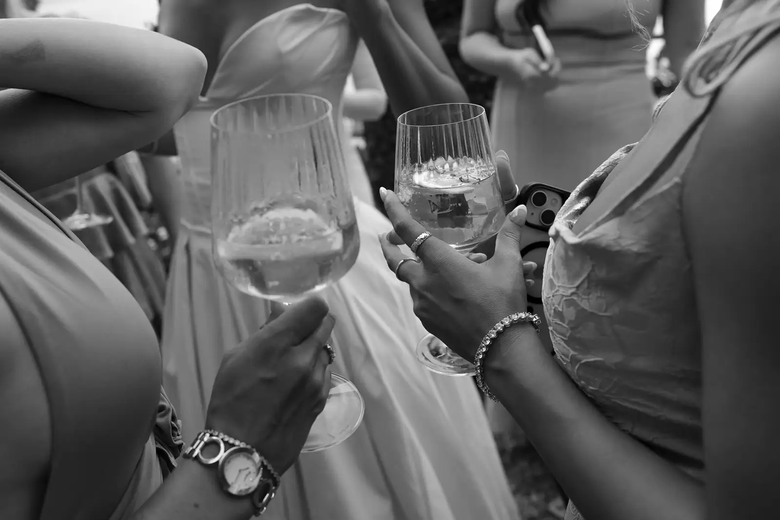 Friends toasting with crystal glasses at a celebration event
