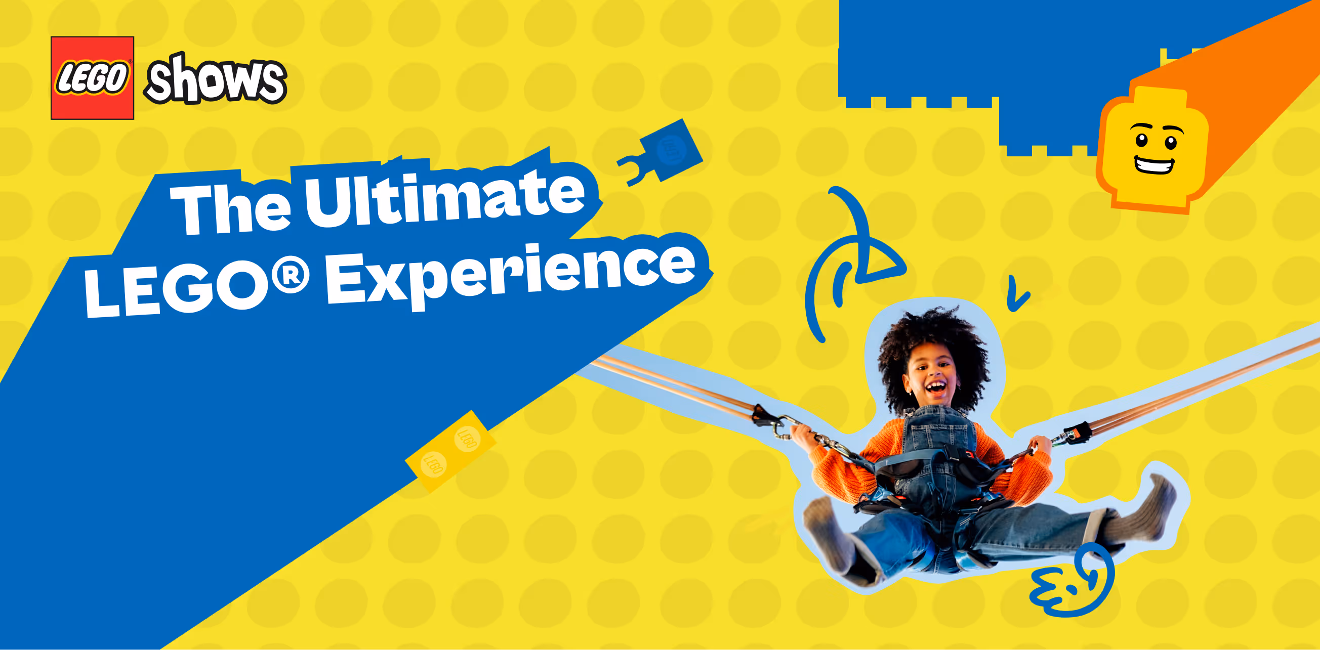 Smiling child in safety harness swinging, with text 'The Ultimate LEGO Experience' on yellow background with LEGO bricks and logo.