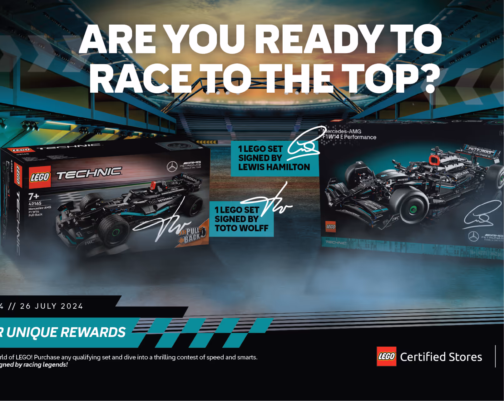 Two LEGO Technic Mercedes-AMG F1 W14 sets displayed in a race stadium, one signed by Lewis Hamilton and the other signed by Toto Wolff.