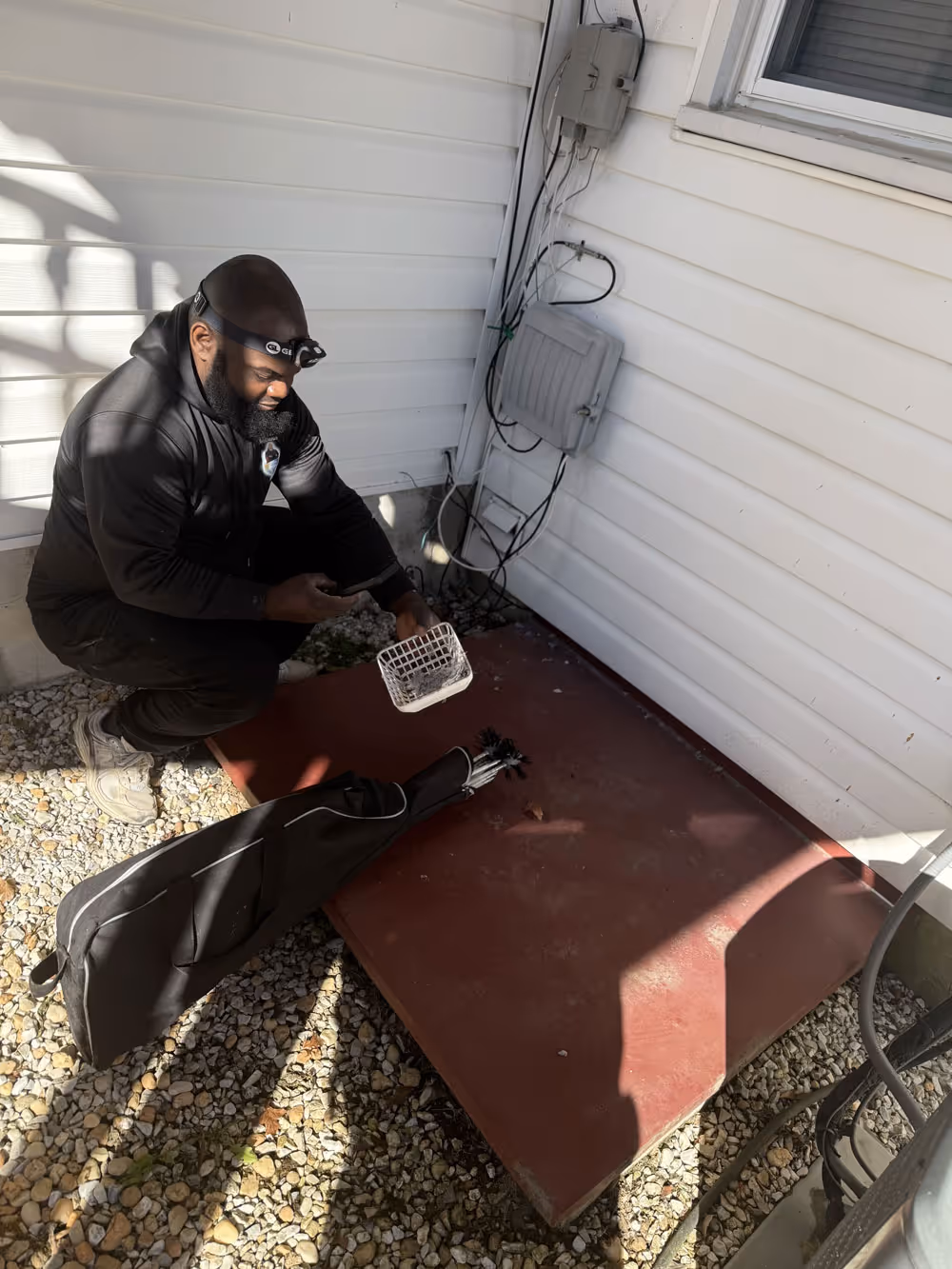 Pollard's Dryer Vent Cleaning technician is cleaning a dryer vent for a Folcroft home.