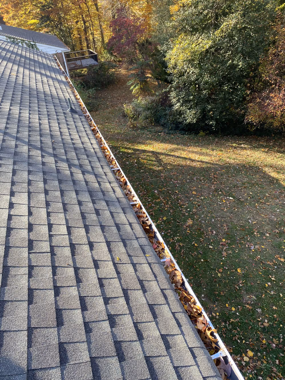 Clogged gutters for a Folcroft home before being cleaned.