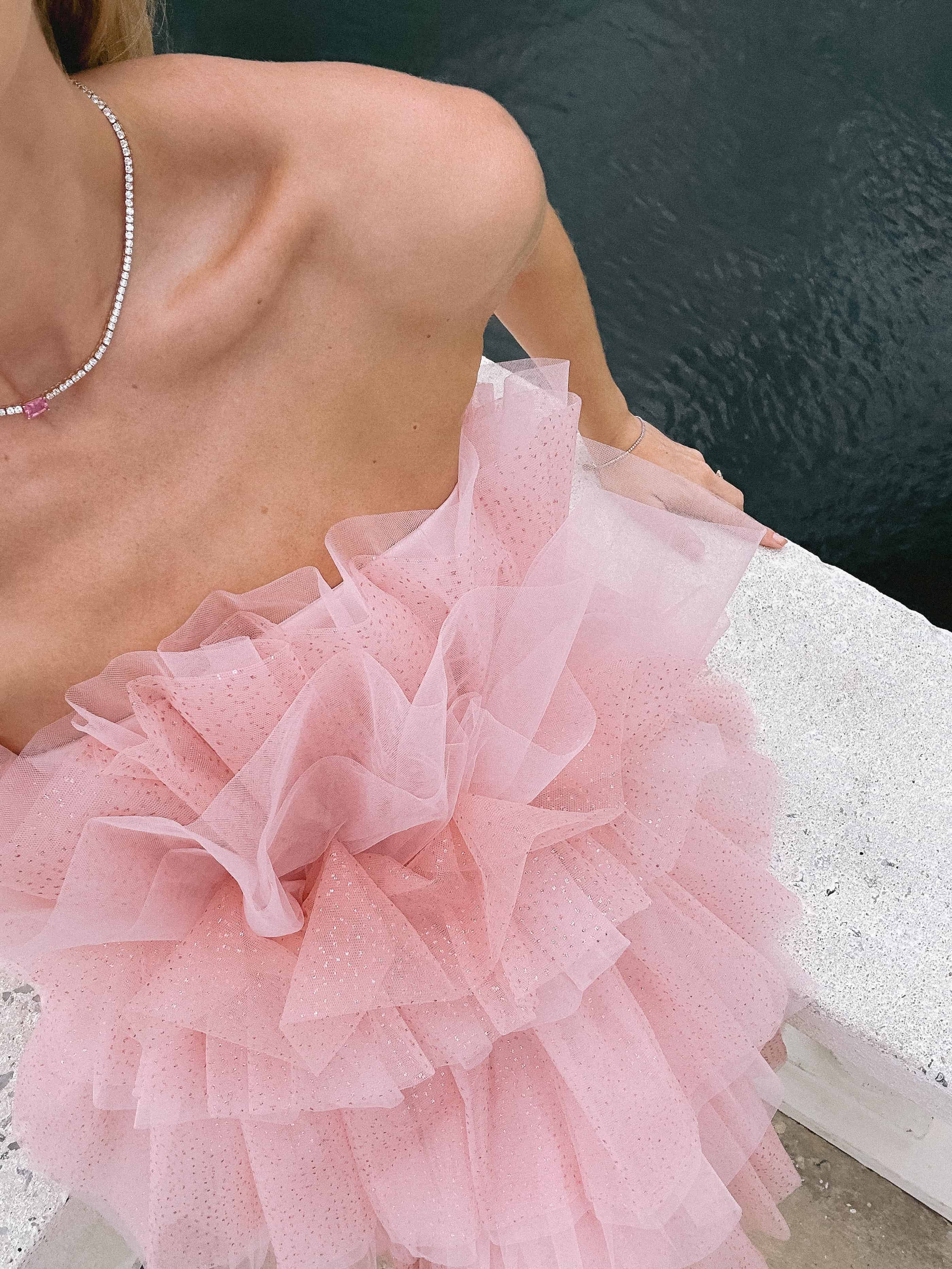 woman wearing a fluffy pink dress