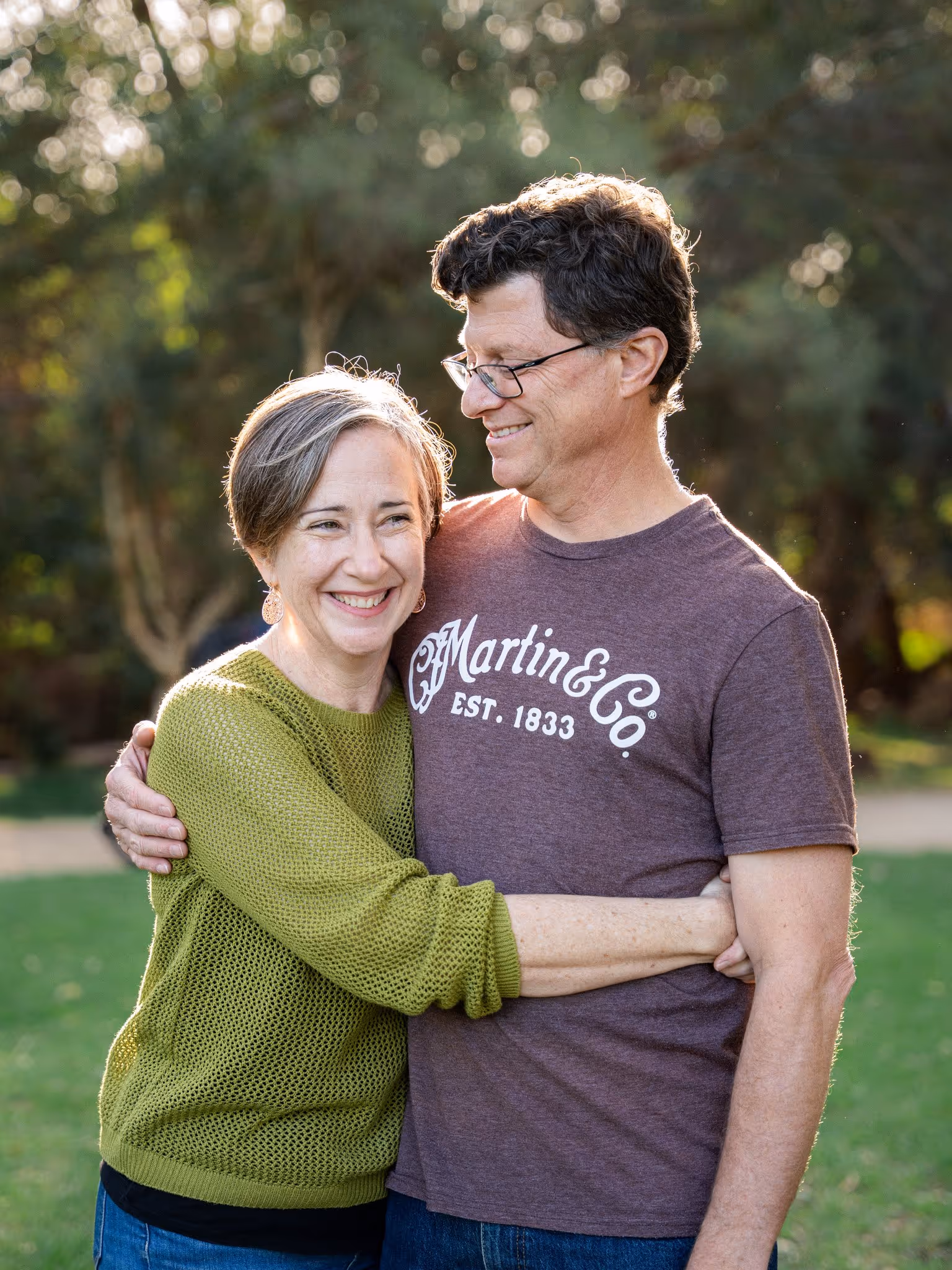 Portait of couple in the park, sunset