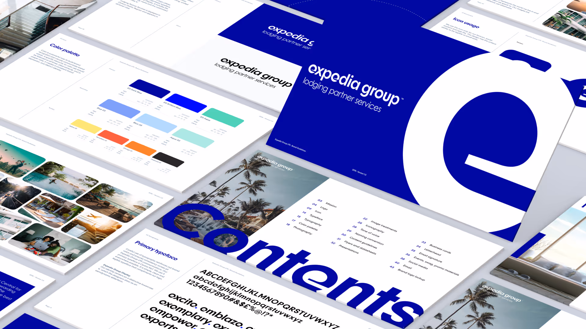 Isometric view of Expedia Group brand identity materials including business cards, color palettes, and marketing collateral spread across white surface.