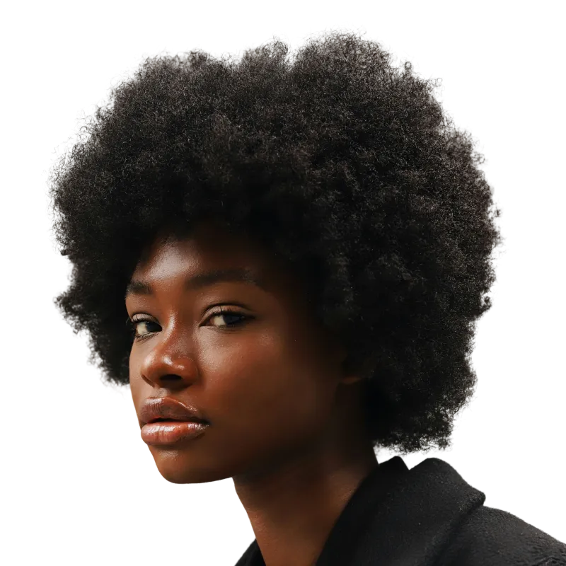 Portrait of a woman with natural afro hair looking thoughtfully to the side.