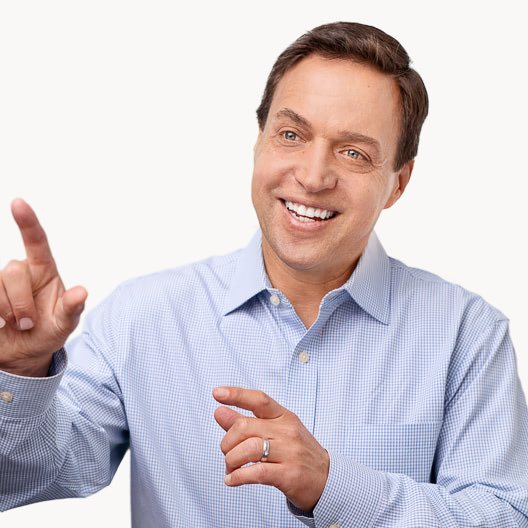 Smiling man with blue blazer and brown hair