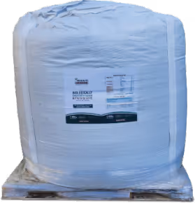 Large white industrial sack labeled with product and company information placed on a wooden pallet.