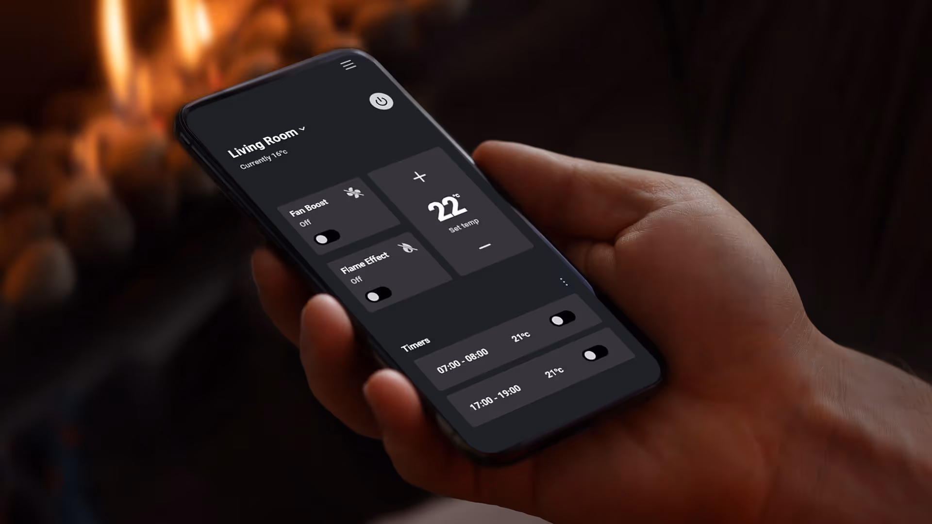 Hand holding smartphone displaying a smart heating app set to 22°C with fan boost and flame effect off.