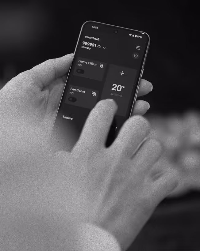 Person using a smartphone app to control a heater with options for flame effect, fan boost, and setting temperature to 20 degrees.