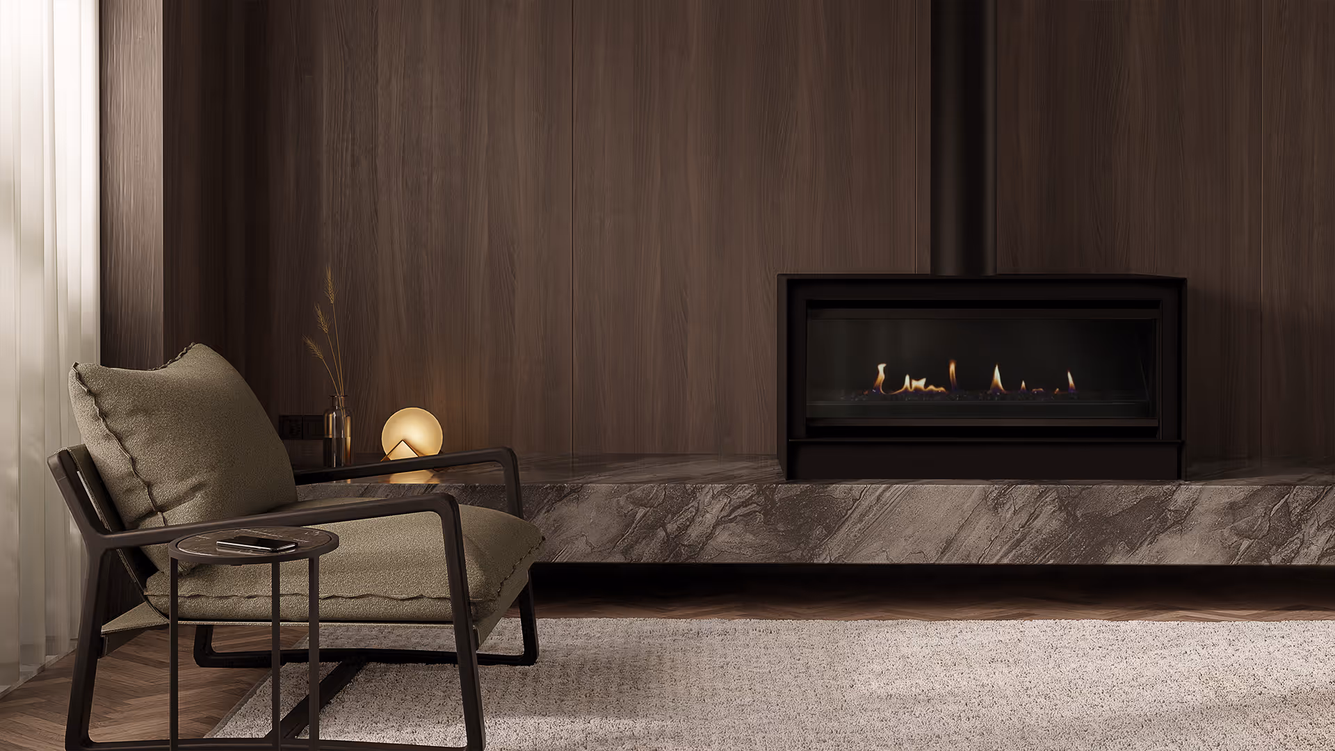 Modern gas fireplace with realistic burning logs set in a light-coloured wall next to a wooden side table with books.