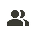 Icon of two people side by side representing teamwork or group.