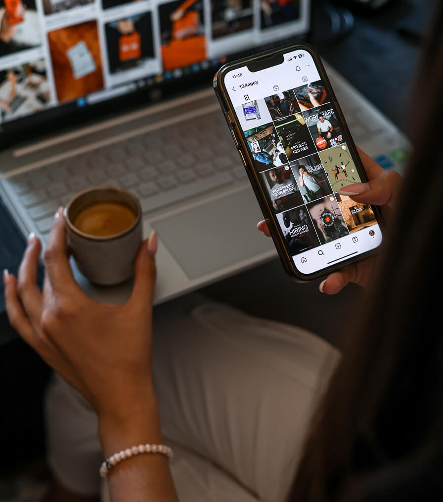 Abstract black and white image with blurred, vertical light streaks resembling smoke or flowing fabric.