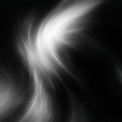 Abstract swirling white smoke or mist pattern on a black background.
