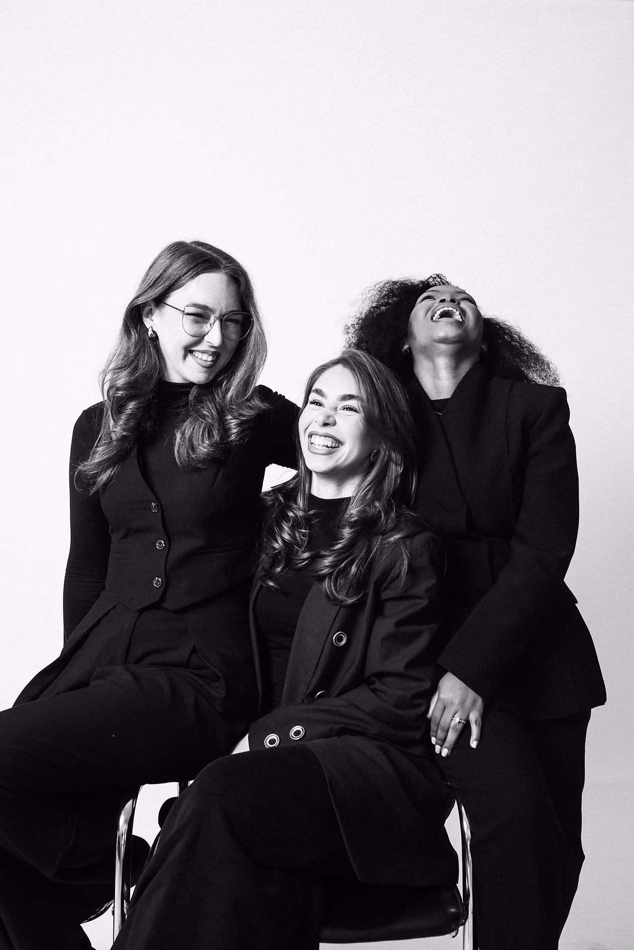 Three women laughing