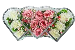 Three heart-shaped sections filled with pink roses and white flowers arranged closely.