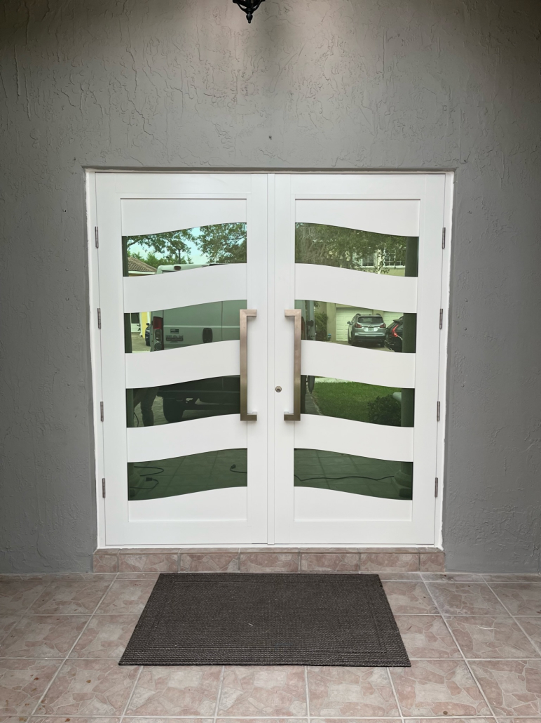 Front entry impact door Miami FL white panel design