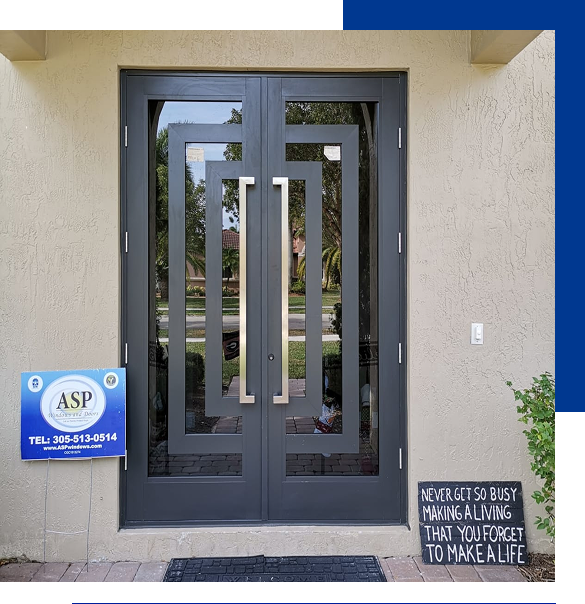 Modern double front door with reflective glass panels and metal handles