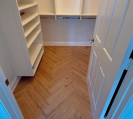 flooring installation in empty walk-in closet 